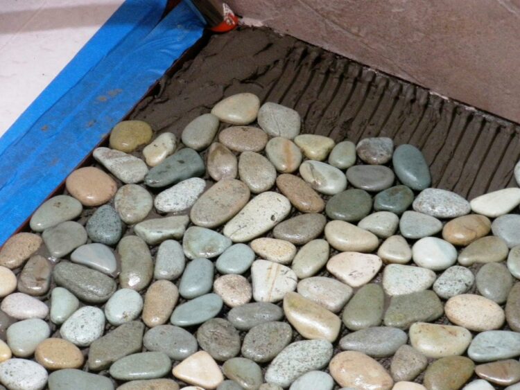 Amazing DIY Adding Glass Flooring With Pebble In Your Home